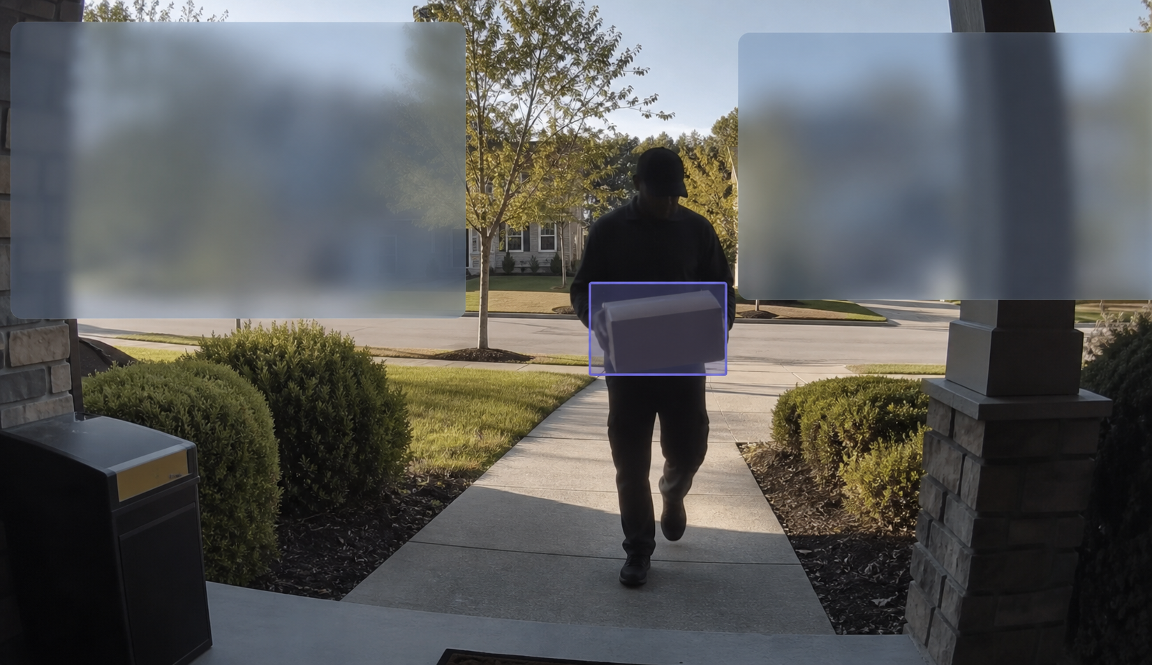Doorbell camera view with privacy zones masking neighboring areas while highlighting a package delivery zone.
