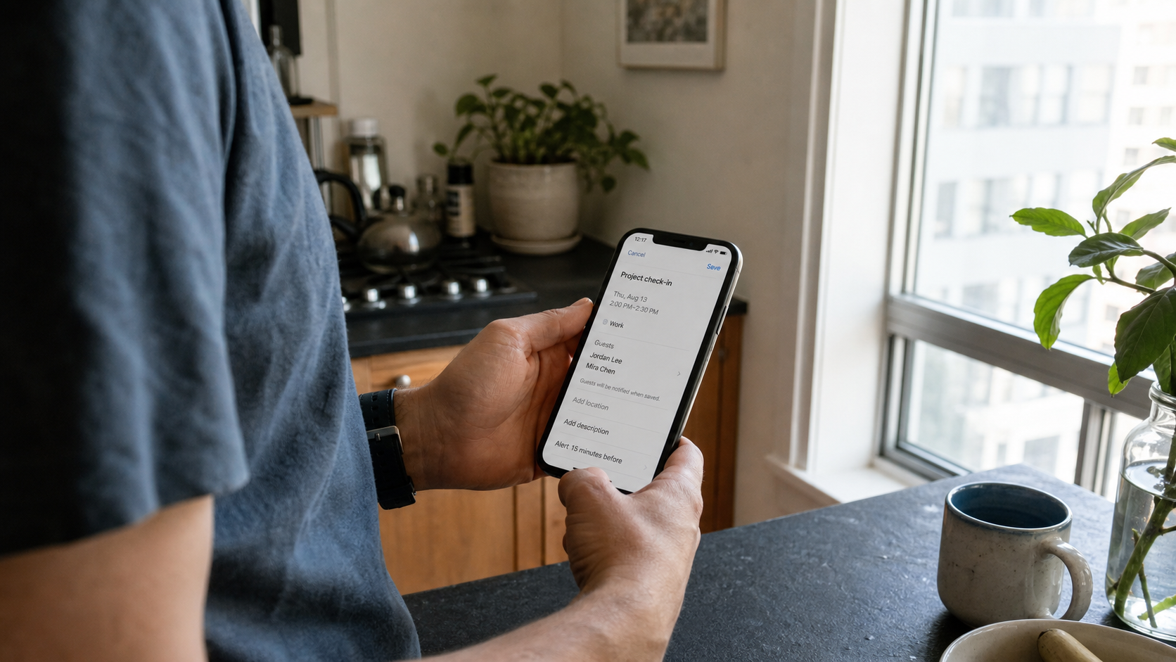 Hands hold a phone showing a project check-in's date, time, attendees, and Save button before scheduling.
